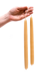 Hand dipped beeswax tapers, candles isolated on white background