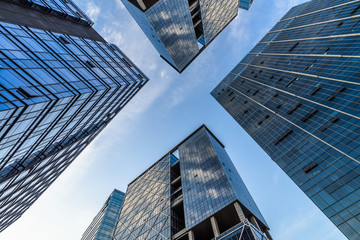 Plakat low angle view of skyscrapers in city of China.