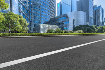 empty urban road with modern building in the city.