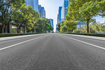 empty urban road with modern building in the city.