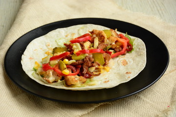  tortilla with vegetables and meat