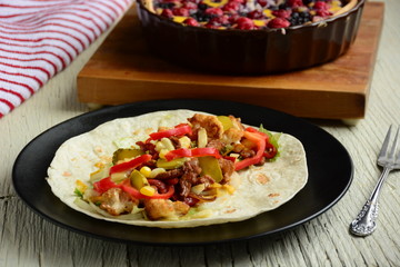  tortilla with vegetables and meat