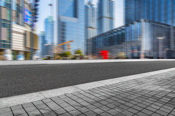 empty urban road with modern building in the city.