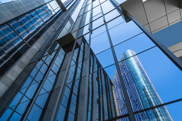 Obraz premium detail shot of modern business buildings in city
