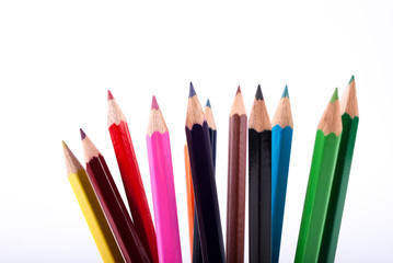 Colorful wooden pencils isolated on white background, close up