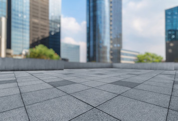 Fototapeta premium empty pavement and modern buildings in city