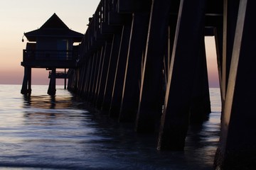 Silhouette of Pier at Sunset - 185709044