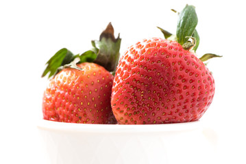 Strawberries in a white mug