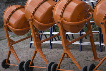 orange concrete mixer on wheels