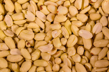 Texture of peeled roasted peanuts for the background