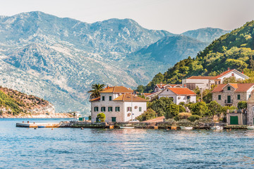 View on the coast from ferry transporting cars and people in Lepetane, Kotor, Montenegro.
