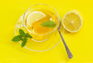 Top view of cup of tea with mint and lemon © An-T