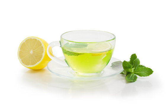 Mint tea with lemon on a white background