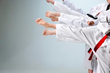 Foto op Canvas The studio shot of group of kids training karate martial arts © master1305