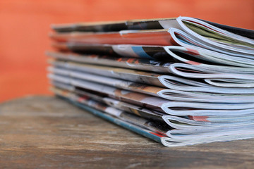 Magazines on the wooden table