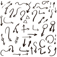 Arrow doodles vector. A set of simple sketches of arrows. Up, down, left, right ones. The effect of a pencil sketch isolated on white background.. Vector eps 10.