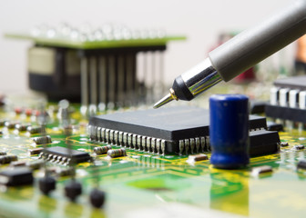 Circuit board with electronic components background. Electronic circuit board with parts