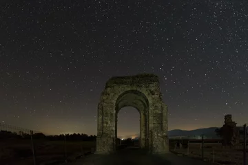 Afwasbaar behang Rudnes Night photography in the Roman ruins of Caparra. Extremadura. Spain.