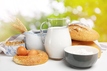 Bread and milk on the table