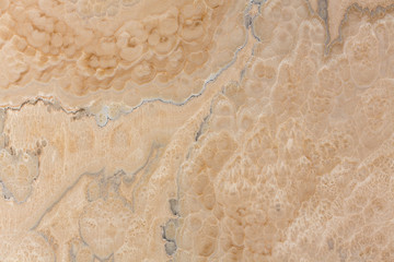 Beige texture of natural stone , onyx.