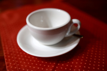 Empty white teacup