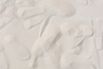 Fine beach sand in summer sun