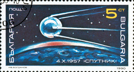 Ukraine - circa 2017: A postage stamp printed in Bulgaria shows picture Sputnik, First Artificial Satellite, 1957. Series: Space Research, Exploration, circa 1990 - obrazy, fototapety, plakaty