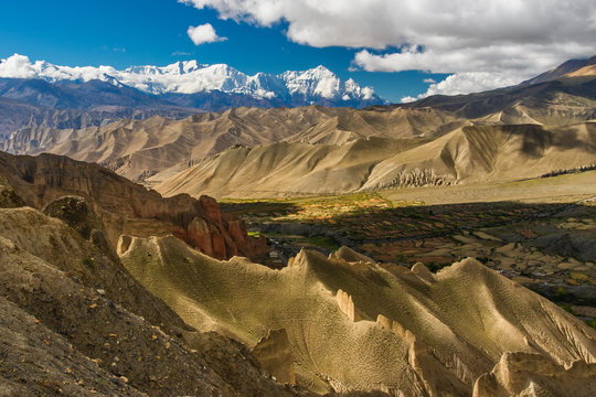 Nepal - Upper Mustang - View on Himalayian mountains en route from Dhakmar to Lo Gekar