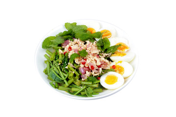 Isolated of Spicy Chinese morning glory salad with boiled egg topped pork chops is popular Thai food.