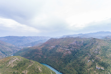 Fototapeta premium Aerial view on River in the mountains of Bosnia and hercegovina 