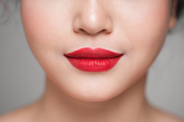 Fototapeta premium Red Sexy Lips closeup. Make up concept. Beautiful Perfect Lips.