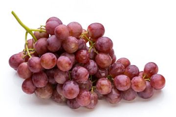Ripe red grape isolated on white.