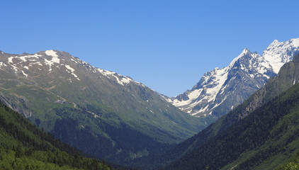 Fototapeta na wymiar Caucasus mountains summertime. The Dombai mountain landscape