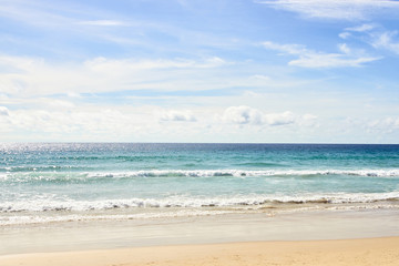 Fototapeta na wymiar Blue sea. Beach. White Waves