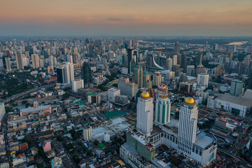 Naklejka na ściany i meble gray metropolis with tall skyscrapers - picture of Bangkok from a tall skyscraper