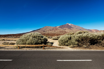 Stretch of road going through Teide National Park, Tenerife, leading to Montana Blanca. The landscape throughout this park is very rich and colourful due to the central Teide volcano.