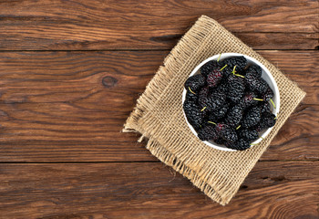Black mulberries in bowl