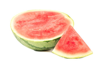 Half watermelon with slice