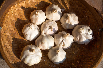 Garlic on rattan basket background, Garlic on wicker basket background, Top view