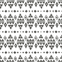 Vector seamless pattern with tribal indian american ornaments. Hand drawn ethnic texture in aztec style. Cute decorative geometric background