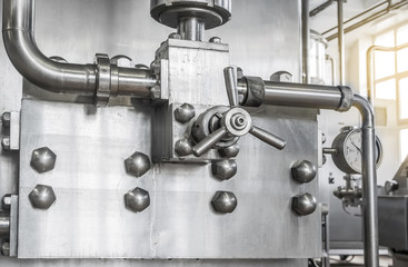 unit is made of stainless pipes. Welding, nuts, bolts, crane. Plant for food production