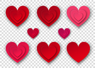 Red  and pink  paper hearts on transparent background.