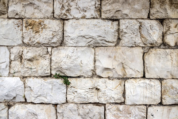 A wall of large blocks of Jerusalem stone, background