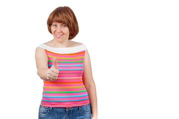 Fototapeta premium Young cute girl smiling and showing thumbs up!