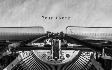 your story typed words on a Vintage Typewriter. Mechanisms closeup. Typing on old typewriter
