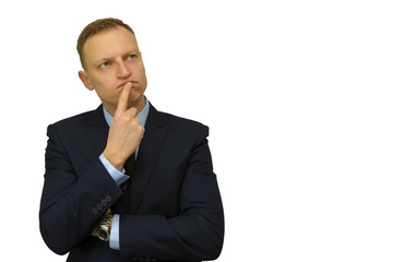 thinking blond man in suit finger near his mouth