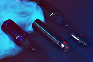 vaping device mod on dark background