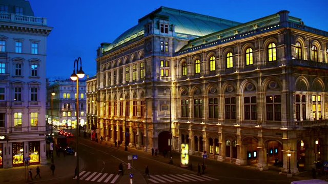 Vienna, Austria. View of State Opera in Vienna, Austria during the night. Bright blue sky