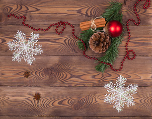 Christmas and New Year holiday background. Christmas decor on a wooden table. Top view, blank space