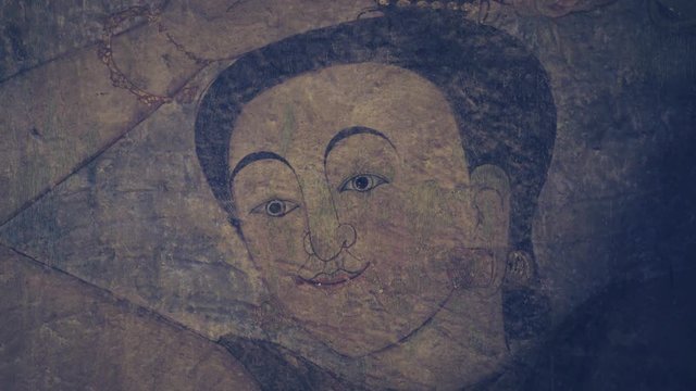 mural painting portrait of a woman looking forward close up shot